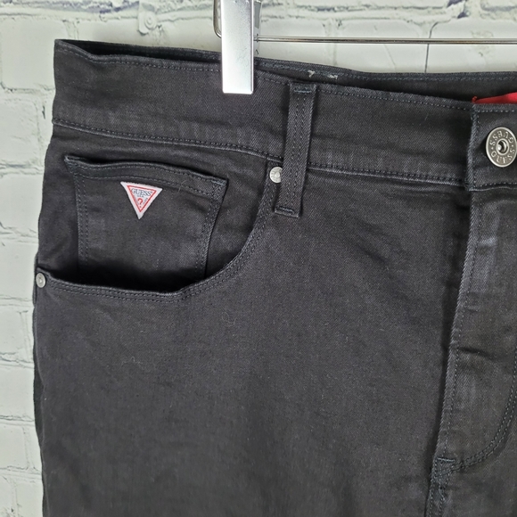 GUESS | Vermont slim fit low rise tapered leg jeans - Picture 5 of 9